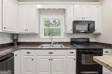 Nestled on a private lot in the quiet Lake Allatoona community - photo 14