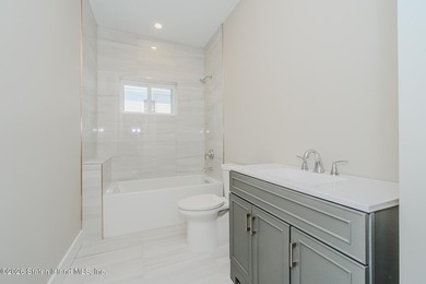 NEW CONSTRUCTION! Beautiful oversized TWO family 6/6 built with - photo 15