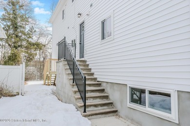 NEW CONSTRUCTION! Beautiful oversized TWO family 6/6 built with - photo 32