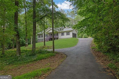 Nestled on a private lot in the quiet Lake Allatoona community - photo 41