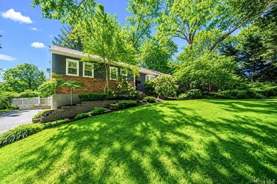 Nestled on a beautifully landscaped property surrounded by - photo 2