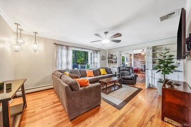 Nestled on a beautifully landscaped property surrounded by - photo 4