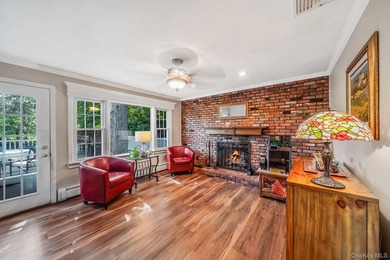 Nestled on a beautifully landscaped property surrounded by - photo 6