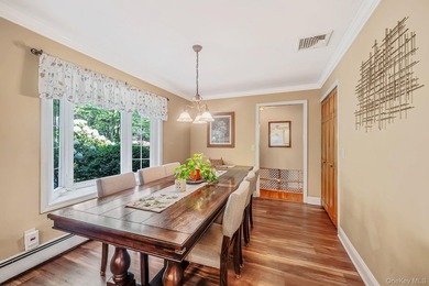 Nestled on a beautifully landscaped property surrounded by - photo 9