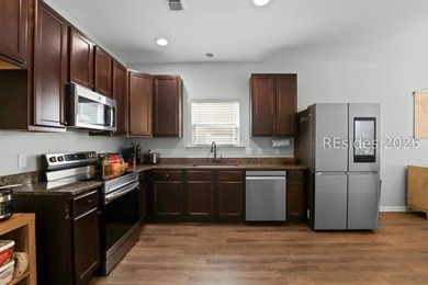 Offered at $400,000, this beautifully maintained 4-bedroom, 2 - photo 9