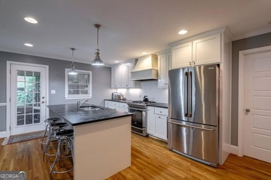 Experience the pinnacle of Normaltown living in this impeccably