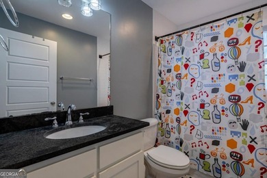 Experience the pinnacle of Normaltown living in this impeccably