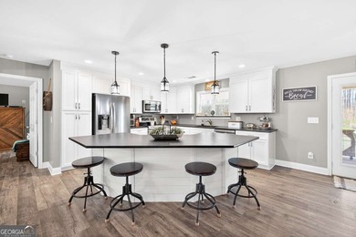 Country Living on 7.22 Acres with Wraparound Porch! Built in