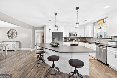 Country Living on 7.22 Acres with Wraparound Porch! Built in