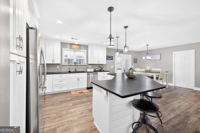 Country Living on 7.22 Acres with Wraparound Porch! Built in