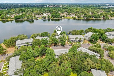Experience tranquil, riverside living in this beautifully fully - photo 1
