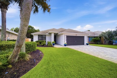 Welcome to this beautifully upgraded coastal retreat in the - photo 3