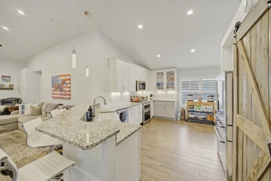 Welcome to this beautifully upgraded coastal retreat in the - photo 5