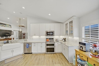 Welcome to this beautifully upgraded coastal retreat in the - photo 6