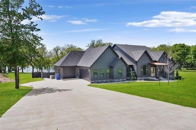 Welcome to your luxurious lakeside retreat in Sunset Shores, a - photo 2