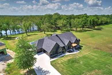 Welcome to your luxurious lakeside retreat in Sunset Shores, a - photo 3