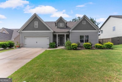 Lake Home For Sale in Flowery Branch, Georgia
