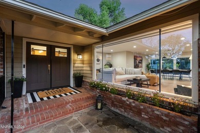 Tucked beneath a canopy of mature trees on a beautifully - photo 1