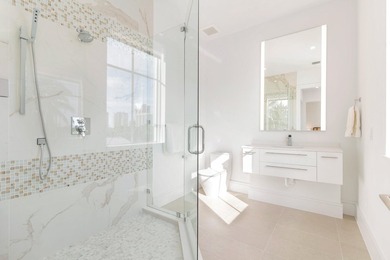 This new construction waterfront residence, completed in 2023 - photo 22