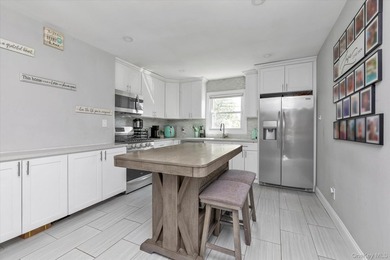Renovated in 2020, this home features a large kitchen, living - photo 6
