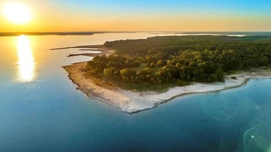 This rare 2-acre waterfront property captures one of the most - photo 2
