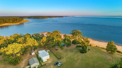 This rare 2-acre waterfront property captures one of the most - photo 4