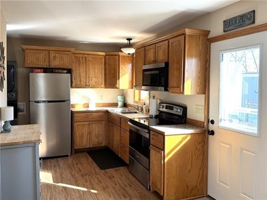 Enjoy lake views with this 1st tier property in Linn Valley - photo 10