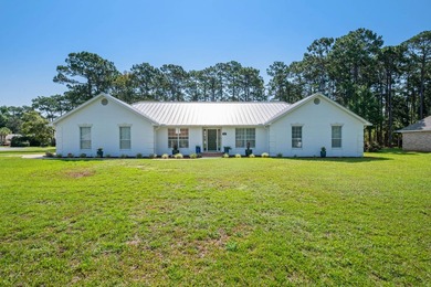 Welcome to 201 Yacht Club Dr. Discover a truly exceptional home - photo 1