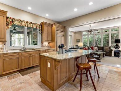Overlooking the scenic 4th hole, this stunning 4-bedroom, 4 - photo 12