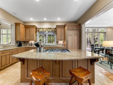 Overlooking the scenic 4th hole, this stunning 4-bedroom, 4 - photo 13