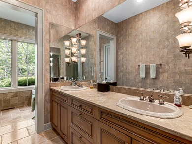 Overlooking the scenic 4th hole, this stunning 4-bedroom, 4 - photo 21