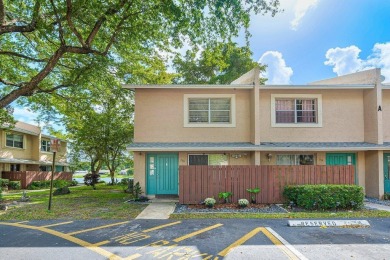 Lake Townhome/Townhouse For Sale in Coconut Creek, Florida