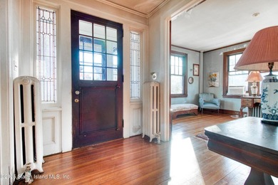 Step into the elegance of a bygone era at 219 Kingsley Avenue, a - photo 3