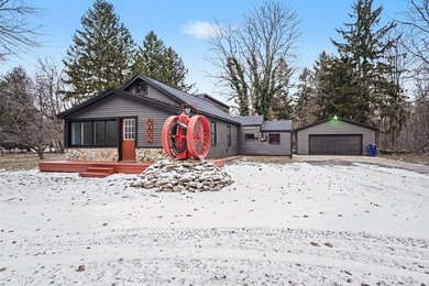 (private lake, pond, creek) Home Sale Pending in Norton Shores Michigan