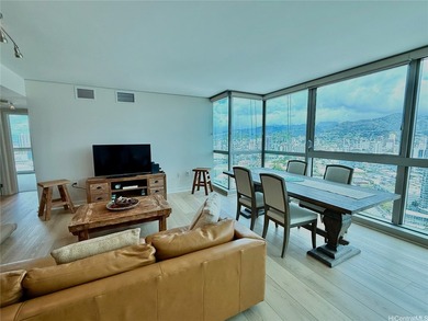 Rarely available high floor corner '01' residence on the - photo 1
