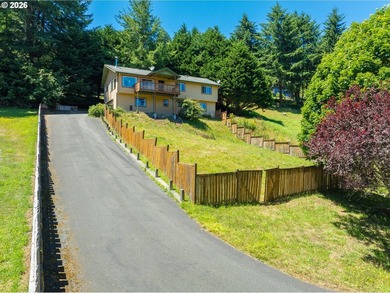 Nestled on over half an acre, this versatile 2-story home offers - photo 2