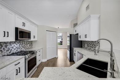 Tucked away in a quiet gated community, this beautifully - photo 3