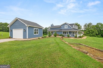 A beautifully remodeled farmhouse situated on 13.39 private - photo 3