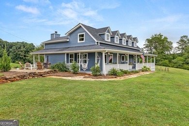 A beautifully remodeled farmhouse situated on 13.39 private - photo 4