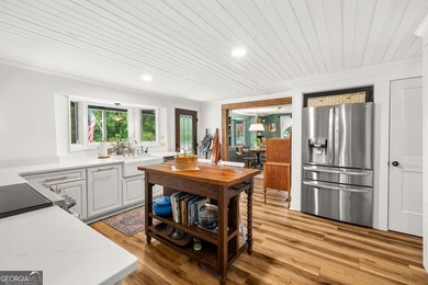 A beautifully remodeled farmhouse situated on 13.39 private - photo 10