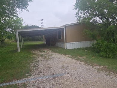 Lake Granbury Home Active Under Con in Granbury Texas