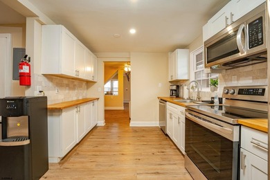 This 3-bedroom, 2-bath home offers a bright and inviting - photo 8