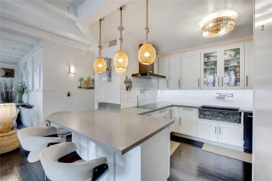 Welcome to this 1st floor expansive two bedroom corner unit in