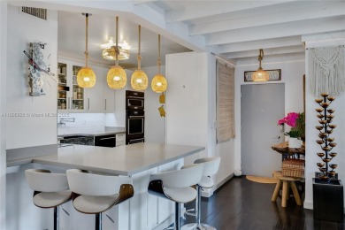 Welcome to this 1st floor expansive two bedroom corner unit in