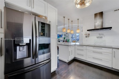 Welcome to this 1st floor expansive two bedroom corner unit in