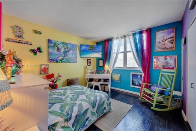 Welcome to this 1st floor expansive two bedroom corner unit in