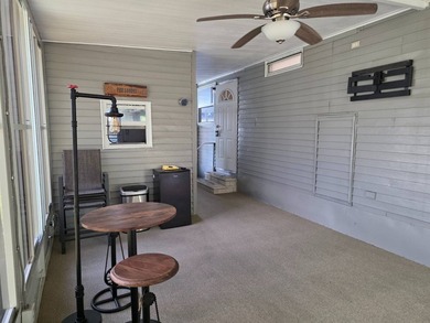 THIS HOME IS ON LEASED LAND WITH A MONTHLY LOT RENT OF $650 AND - photo 11