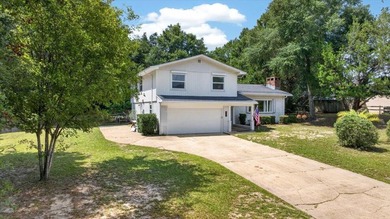 Nestled on a spacious double lot of just over half an acre, this - photo 2