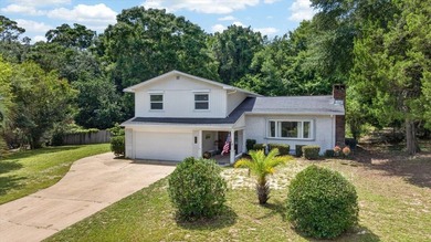 Nestled on a spacious double lot of just over half an acre, this - photo 3