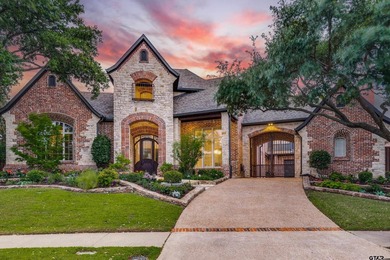 Situated in the prestigious gated community of The Lakes on - photo 1